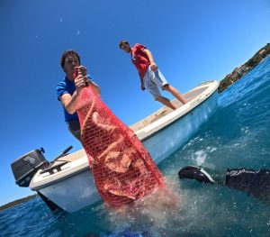 Diver removing rubbish from Loviste Bay