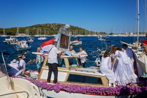 returning the painting of Our Lady by boat from the Parish Church to the Chapel on the Gradina peninsula in Rogoznica