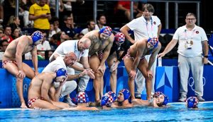 Ivica Tucak, head coach of team Croatia talks to the team during a time out of the water polo men semifinal match between team Hungary (white caps) and team Croatia (blue caps) of the Paris 2024 Olympic Games at La Defense Arena in Paris (France), August 09, 2024.