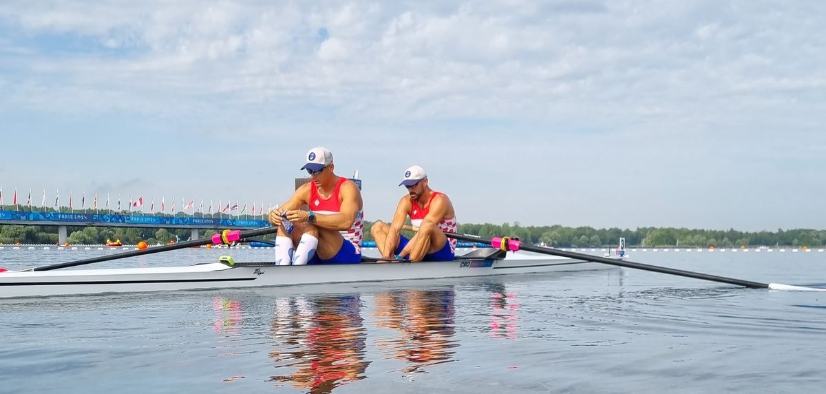 Martin and Valent Sinkovic in Paris at the Olympic Games with their gold medals 